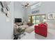 Bright living room with high ceilings, backyard views, and comfortable seating at 2150 Longwood Lakes Dr. # 2150, Myrtle Beach, SC 29579