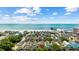 An aerial view showcases the home's location near the beach and pier at 22 Ocean Blvd. N, Surfside Beach, SC 29575