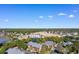 Aerial view showcases the property with the address 223 Maison Dr and surrounding green landscape at 223 Maison Dr. # 14D, Myrtle Beach, SC 29572