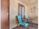 Cozy porch with two chairs, a small table, and decorative coastal accents at 223 Maison Dr. # 14D, Myrtle Beach, SC 29572