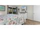 Bright bedroom features a comfortable queen-size bed with seaside decor at 223 Maison Dr. # 14D, Myrtle Beach, SC 29572