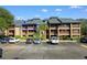 Exterior view of a condo building highlights Unit D-14, with a balcony on one of the floors at 223 Maison Dr. # 14D, Myrtle Beach, SC 29572
