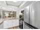 Bright kitchen featuring stainless steel appliances and a unique spiral staircase at 223 Maison Dr. # 14D, Myrtle Beach, SC 29572