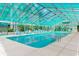 Indoor pool with plenty of lounge chairs for relaxing and clear water for swimming at 223 Maison Dr. # 14D, Myrtle Beach, SC 29572