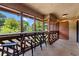 Balcony with seating area and lights overlooking the trees at 223 Maison Dr. # C-13, Myrtle Beach, SC 29572