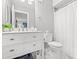 Bright bathroom with vanity, modern fixtures, lots of counter space and stylish toilet at 223 Maison Dr. # C-13, Myrtle Beach, SC 29572