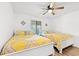Bedroom featuring hardwood floors, ceiling fan, and two twin-sized beds at 223 Maison Dr. # C-13, Myrtle Beach, SC 29572