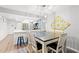 Stylish dining area leading to a modern kitchen and offering seating for six, featuring stainless appliances at 223 Maison Dr. # C-13, Myrtle Beach, SC 29572