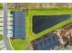 Overhead shot featuring the home's placement near a pond with green spaces and newly constructed properties at 2352 Elowen Ln. # 22B, Longs, SC 29568