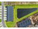 Overhead shot featuring the home's placement near a pond with green spaces and newly constructed properties at 2352 Elowen Ln. # 22B, Longs, SC 29568