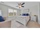 Cozy bedroom with a ceiling fan, and a large window offering plenty of natural light at 2352 Elowen Ln. # 22B, Longs, SC 29568