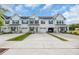 Exterior shot of townhouses with private driveways and garage space at 2352 Elowen Ln. # 22B, Longs, SC 29568