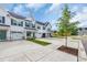 Charming townhomes with white exteriors, garage parking, and landscaped front yards for curb appeal at 2352 Elowen Ln. # 22B, Longs, SC 29568