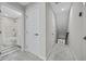 Hallway view of the bathroom, stairway to the basement, and several doors in the hall at 2352 Elowen Ln. # 22B, Longs, SC 29568