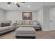Relaxing living room featuring neutral furnishings, wood-look floors, and stylish decor at 2352 Elowen Ln. # 22B, Longs, SC 29568