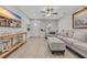 Bright living room featuring stylish furnishings, wood-look floors, and comfortable seating at 2352 Elowen Ln. # 22B, Longs, SC 29568