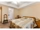 Cozy bedroom with a seating area, bedside tables, and neutral carpet at 24 Gate 7, Carolina Shores, NC 28467