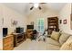 Inviting bedroom featuring a comfortable seating area and natural light at 24 Gate 7, Carolina Shores, NC 28467