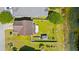 Aerial view of a backyard with a fenced yard, gazebo, and fire pit at 309 Foxpath Loop, Myrtle Beach, SC 29588