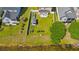 Aerial view of a backyard with a fenced yard, gazebo, and fire pit at 309 Foxpath Loop, Myrtle Beach, SC 29588