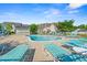 A view of the neighborhood pool and amenities with plenty of seating at 309 Foxpath Loop, Myrtle Beach, SC 29588