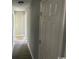 Hallway with grey walls and wood-style floors at 321 Circle Heights Dr., Loris, SC 29569