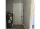 Utility area with water heater and door at 321 Circle Heights Dr., Loris, SC 29569
