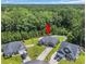 Aerial view of the home, sitting on a mature lot that backs up to a pond at 321 Sanctuary Ct., Myrtle Beach, SC 29588
