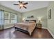 Relaxing bedroom with a ceiling fan and plentiful natural light at 321 Sanctuary Ct., Myrtle Beach, SC 29588