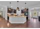 Modern kitchen with granite countertops, stainless steel appliances, and dark wood cabinets at 321 Sanctuary Ct., Myrtle Beach, SC 29588