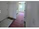 Hallway view into the room shows the hardwood floors and white trim at 3619 Allentown Dr., Conway, SC 29526