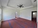 This main bedroom offers ample space and a modern ceiling fan, ready for you to unwind and personalize at 3619 Allentown Dr., Conway, SC 29526