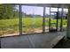 Spacious screened-in porch offers stunning views of the lush backyard and peaceful outdoor living at 3619 Allentown Dr., Conway, SC 29526