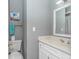 Well-lit bathroom with a vanity, toilet, and soft blue accents at 4018 Fairway Lakes Dr. # 4018, Myrtle Beach, SC 29577