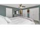 Bedroom with natural light, white bedding, and access to closets at 4018 Fairway Lakes Dr. # 4018, Myrtle Beach, SC 29577