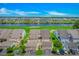 Rear exterior of residential building with spacious parking, back patios, golf course, and waterway views at 4018 Fairway Lakes Dr. # 4018, Myrtle Beach, SC 29577
