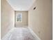 Small bedroom with painted wooden floors and a window at 415 42Nd Ave. N, Myrtle Beach, SC 29577