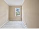 Small bedroom with window and painted wooden floors at 415 42Nd Ave. N, Myrtle Beach, SC 29577