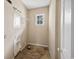 Laundry room featuring a window and some exposed wall at 415 42Nd Ave. N, Myrtle Beach, SC 29577