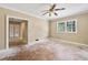 Bright living room featuring an open doorway and a large window at 415 42Nd Ave. N, Myrtle Beach, SC 29577
