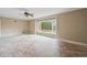 Light-filled living room featuring a large window with backyard views at 415 42Nd Ave. N, Myrtle Beach, SC 29577