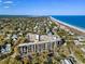 Panoramic view of the condo and the ocean featuring spacious balconies and lush surroundings at 423 Parker Dr. # 613, Pawleys Island, SC 29585