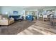 Spacious living area open to the kitchen, with plush seating and contemporary decor at 423 Parker Dr. # 613, Pawleys Island, SC 29585