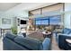 Bright living room featuring ocean views, a fireplace, and comfortable seating at 423 Parker Dr. # 613, Pawleys Island, SC 29585