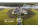 Aerial view of a gated community featuring only 18 homes in a coastal setting at 4525 Landing Rd., Little River, SC 29566