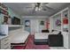 Versatile basement with a pull-down bed, perfect for hosting guests or creating a multi-functional space at 4525 Landing Rd., Little River, SC 29566