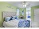 Charming bedroom with a cozy bed and a fun, nautical theme with accents of starfish and sea creatures at 4525 Landing Rd., Little River, SC 29566