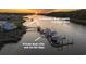 Aerial view of a community boat launch, boat dock, private boat lifts, and jet ski slips at 4525 Landing Rd., Little River, SC 29566