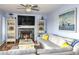 Comfortable living room with a fireplace, built-in shelves, and stylish decor at 4525 Landing Rd., Little River, SC 29566