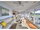 Cozy living room featuring a large sectional sofa, hardwood floors, and natural light at 4525 Landing Rd., Little River, SC 29566